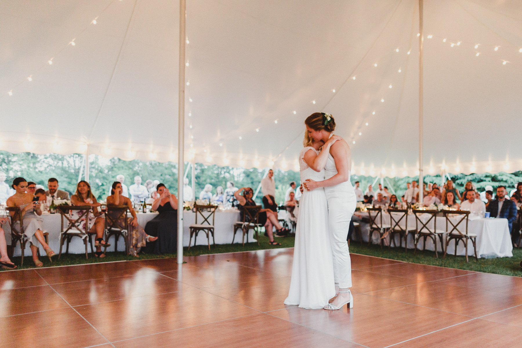 Hockey themed wedding features custom jerseys and a skating bride and groom  at Hersheypark Arena